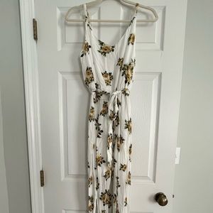 Floral white and yellow wide leg jumpsuit.
